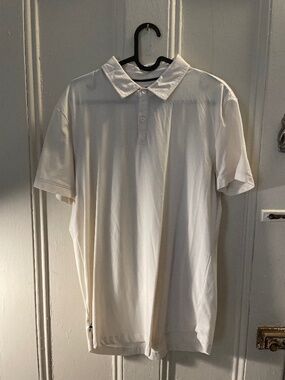 Cuts clothing curved hem polo